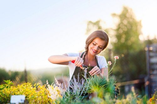 Operative assessing a garden during a pre-site safety check