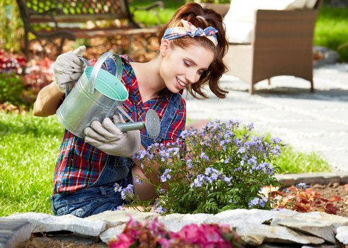 Person using a screen reader on a mobile device while viewing garden care details